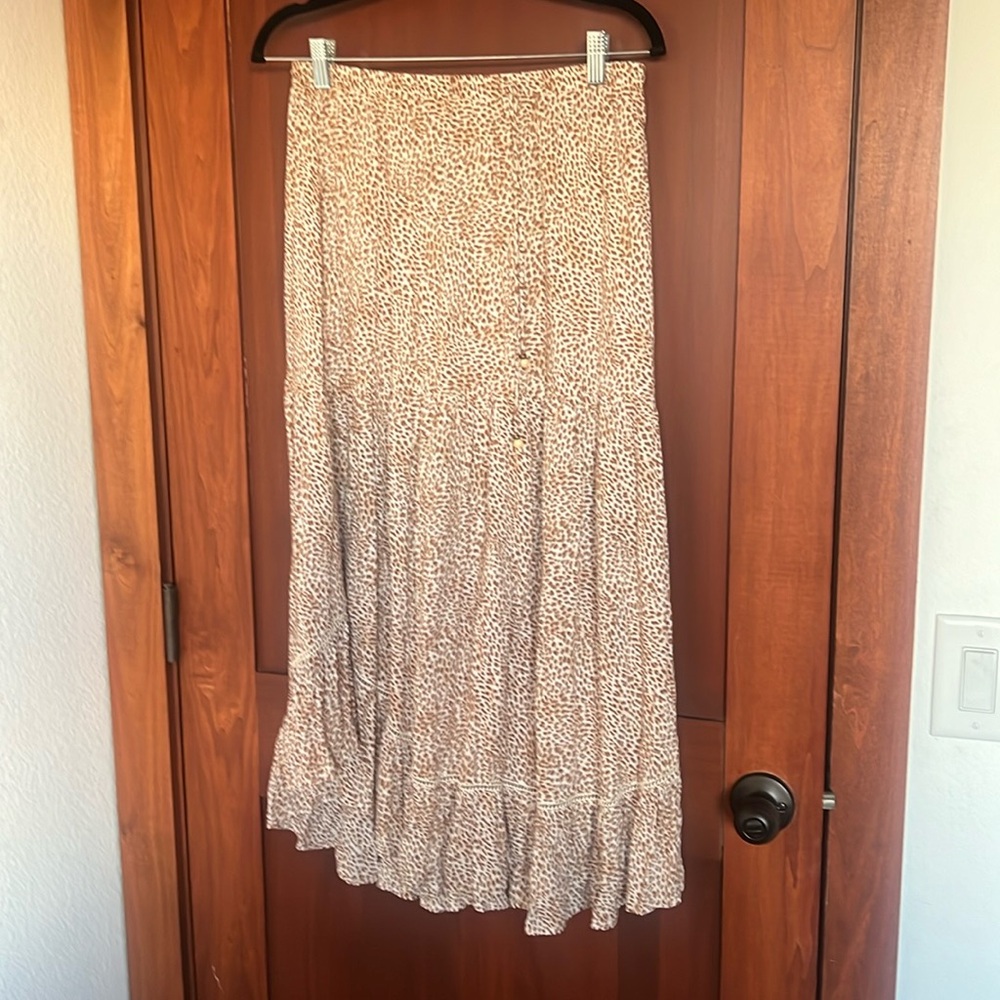 Beautiful Kivari tiered skirt cream with rust colored abstract pattern.